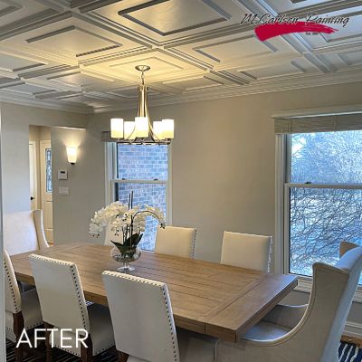 Shoreview dining room after painting, white coffered ceiling above a long oak table