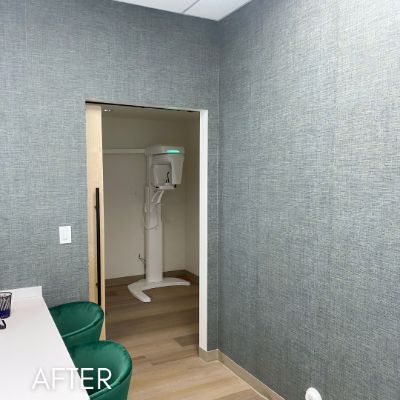 Blue gray grasscloth wallcovering along a clinic corridor