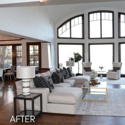 Vaulted living room after painting, white walls around an arched window