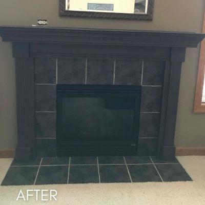 Fireplace surround and tile painted deep navy