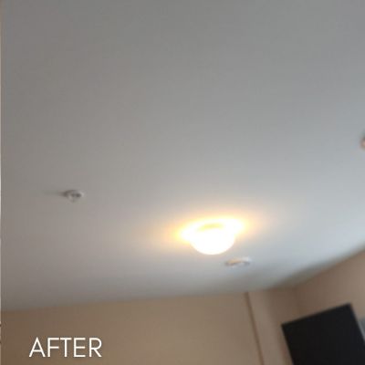 Ceiling after painting, in flat white around a flush light fitting