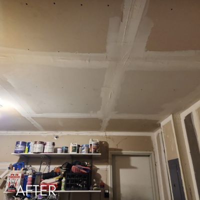 Garage ceiling after drywall repair and priming