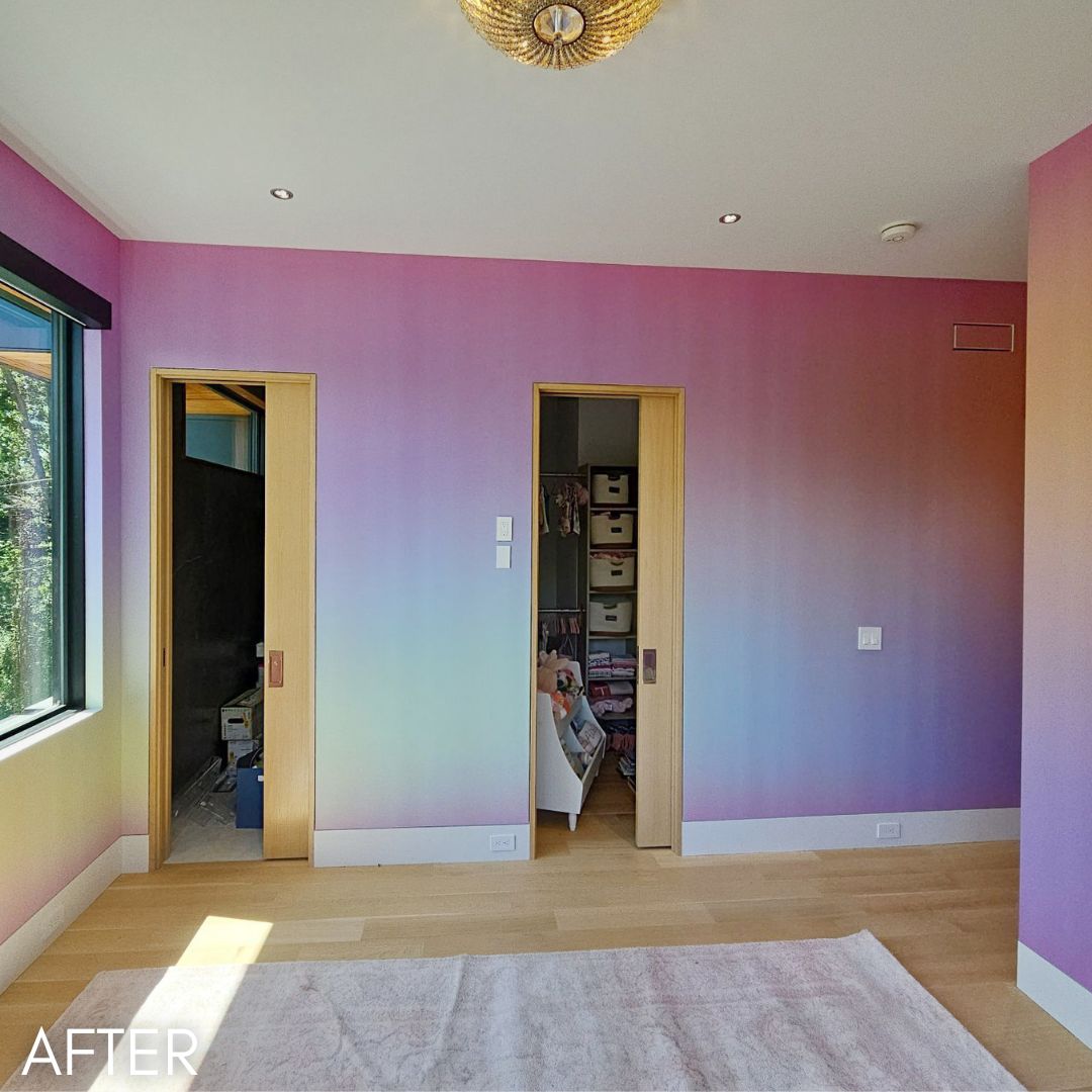 Bedroom painted in a rainbow gradient from pink through gold to lilac